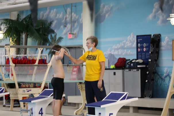 fort mcmurray swim club coach jo young in action